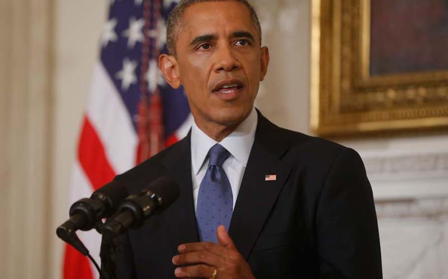 President Barack Obama speaks about the situation in Iraq in the State Dining Room at the White House in Washington, Thursday, Aug. 7, 2014.