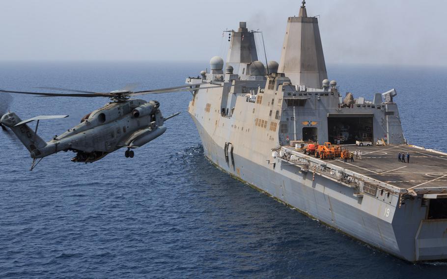 A U.S. Marine Corps CH-53E Super Stallion helicopter prepares to land aboard the amphibious transport dock ship USS the Mesa Verde while underway in the U.S. 5th Fleet area of responsibility, Aug. 4, 2014.  

Manuel A. Estrada/U.S. Navy