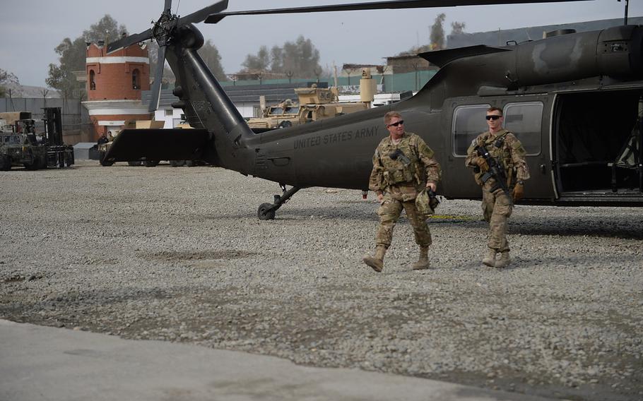 Army Brig. Gen. Christopher Bentley arrives at Afghan Uniformed Police Headquarters in Nangarhar Province, eastern Afghanistan, to discuss recent Afghan operations in Dangam and other areas along the Afghanistan-Pakistan border on Jan. 21, 2015.