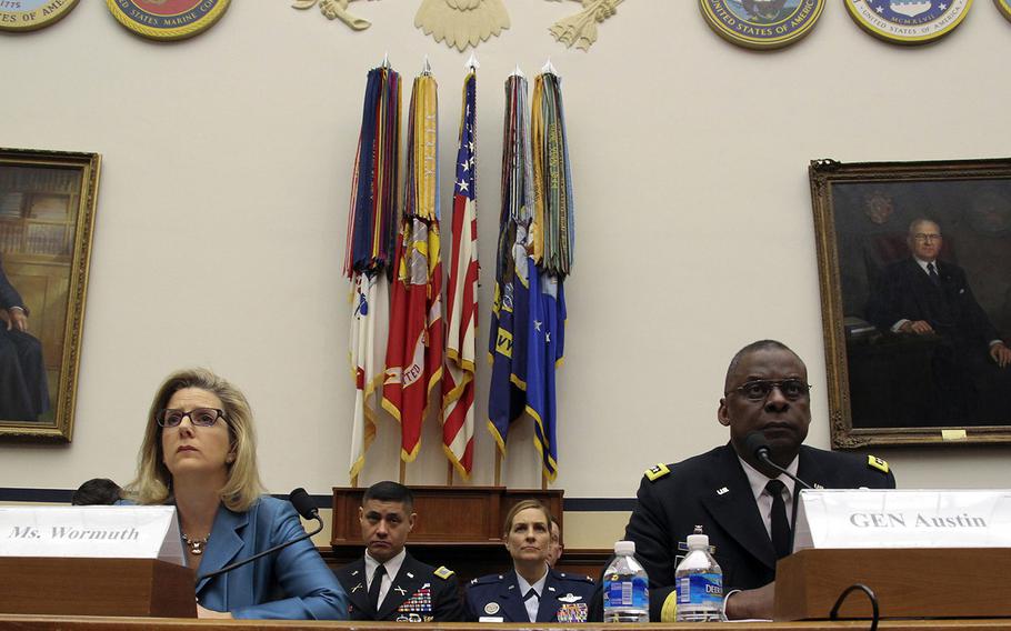 Undersecretary of Defense for Policy Christine Wormuth and CENTCOM Commander Gen. Lloyd Austin testify at a House Armed Services Committee hearing on Capitol Hill, March 3, 2015.