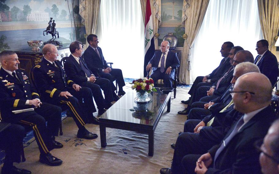 Secretary of Defense Ash Carter meets with Iraqi Prime Minister Haider al-Abadi at Blair House in Washington, D.C., April 15, 2015. 
