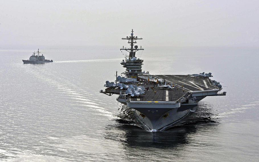 The USS Theodore Roosevelt sails in the U.S. 5th Fleet area of operations on April 16, 2015, as it supports strike operations in Iraq and Syria, as well as maritime security operations efforts. The aircraft carrier is keeping an eye on a floatilla of Iranian ships maneuvering in the area.