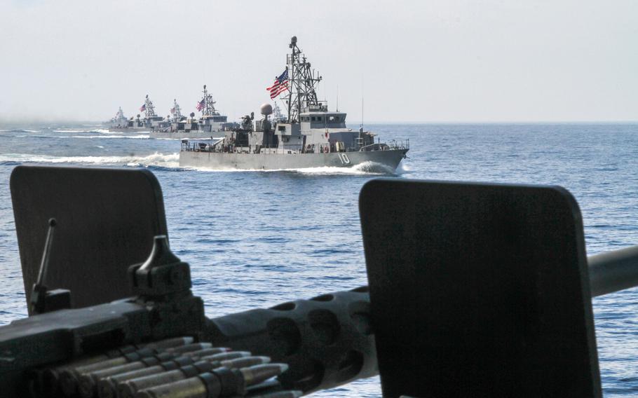 U.S. Navy coastal patrol ships travel alongside one another during a formation and maneuvers exercise in the Persian Gulf in 2014. Three of the vessels and the destroyer USS Farragut were patrolling the Strait of Hormuz on Wednesday, April 29, 2015, a day after Iranian patrol boats seized a container ship registered in the Marshall Islands.