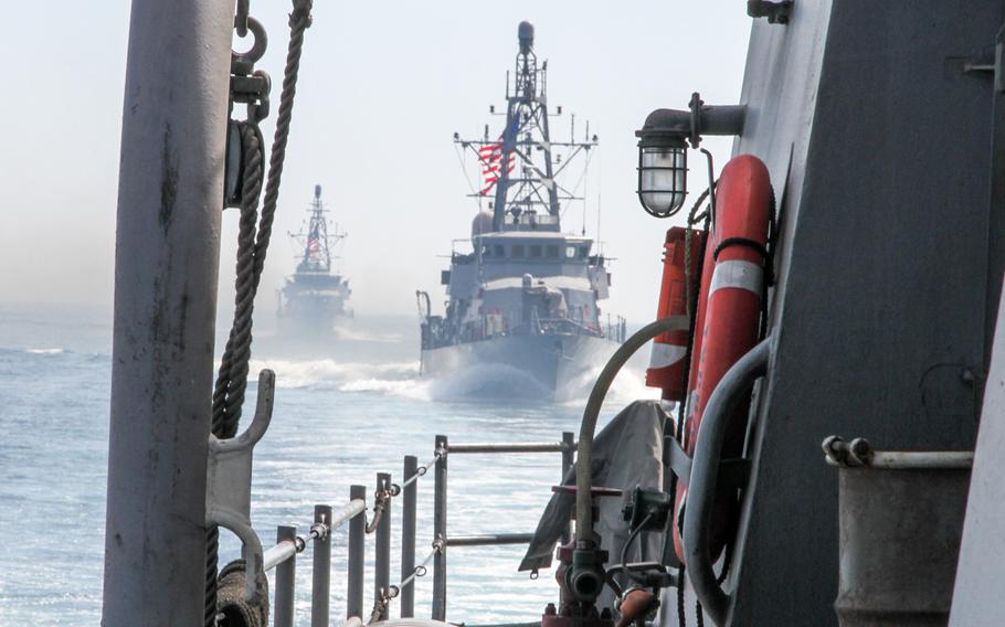 U.S. Navy coastal patrol ships in the Persian Gulf in 2014. Three of the vessels and the destroyer USS Farragut are supporting an "accompanying" mission in the Strait of Hormuz, Friday, May 1, 2015, to provide U.S.-flagged commercial vessels transiting the strait with additional security.