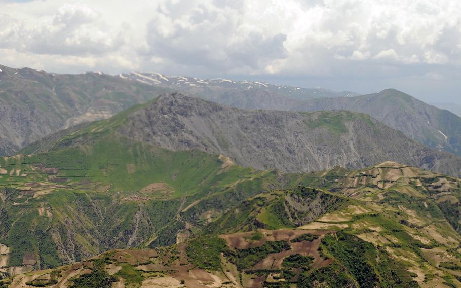 An aerial view June 3, 2012, shows the mountains between Faizabad and Khwahan in Badakhshan province, Afghanistan, an area where Taliban fighters launched a surprise attack on Saturday, June 6, 2015.