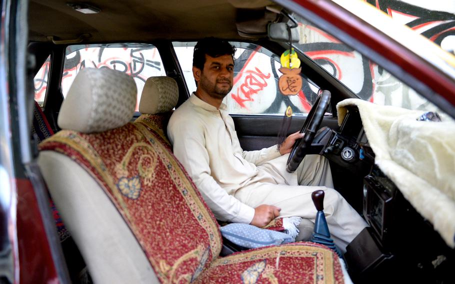 Shir Shah, a Kabul taxi driver, gets behind the wheel of his customized 1986 Toyota Corolla. The vehicle's affordability, fuel-efficiency and deft handling has made the Japanese import a favorite among Afghan drivers.


