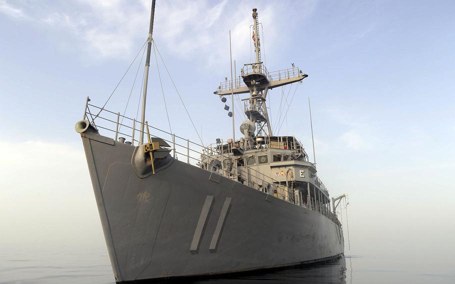 The Avenger-class mine countermeasures ship USS Gladiator uses sonar to assist members of Explosive Ordnance Disposal Mobile Unit 1 to locate training mines in this April 2010 photo.
