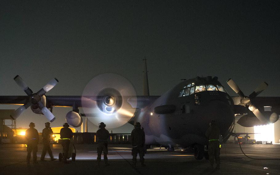 U.S. airmen monitor the engine starts of an AC-130H Spectre gunship on Nov. 27, 2013, at an undisclosed location in Afghanistan. In a report released Thursday, Nov. 5, 2015, Doctors Without Borders said the charity was in communications with coalition forces even as gunfire from an AC-130 gunship rained down on its hospital in northern Afghanistan last month.