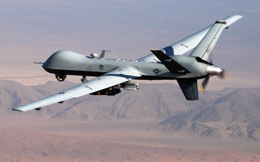 An MQ-9 Reaper drone flies a combat mission over southern Afghanistan in this undated Air Force photo. More than a dozen Islamic State militants were killed in a drone attack in eastern Afghanistan Sunday night, just hours after President Ashraf Ghani said his country was becoming a “graveyard” for members of the terrorist group.