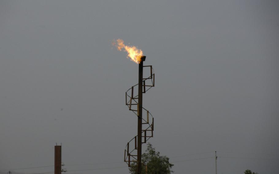 Flame spurts from a flare stack near Kirkuk, Iraq.