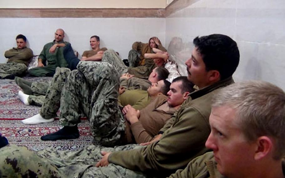 This picture released by the Iranian Revolutionary Guards on Wednesday, Jan. 13, 2016, shows detained American Navy sailors in an undisclosed location in Iran. All 10 of the sailors have been freed.