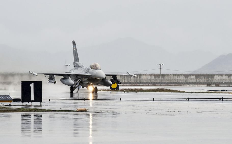 An F-16 Fighting Falcon prepares to test an aircraft arresting system to certify its use on the runway at Bagram Air Field, Afghanistan, March 11, 2016.  