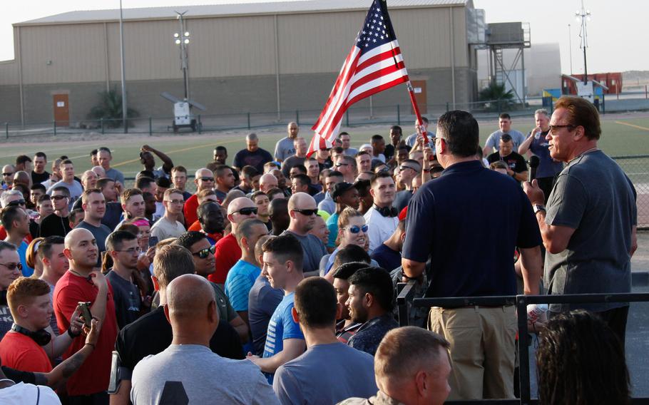 Actor and former California Gov. Arnold Schwarzenegger speaks to soldiers before the Operational Energy 10K Awareness Run at Camp Arifjan, Kuwait, Wednesday, April 27, 2016. Schwarzenegger was in Kuwait to film a National Geographic documentary, "Years of Living Dangerously," focused on climate change. 

