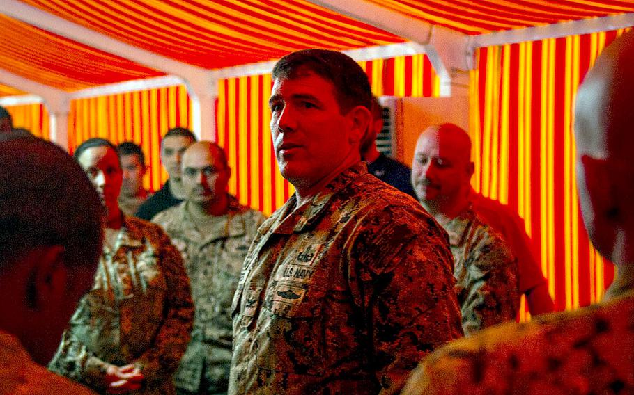 Capt. Kyle Moses, commodore of Commander, Task Force 56, left, briefs sailors and Marines during an exercise on Camp Badger in Jordan on April 13, 2016. Moses was removed as commander of the task force, according to reports on June 23.
