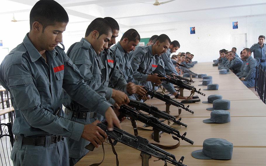 Afghan police soldiers train in Lashkargah, capital of southern Helmand province, Afghanistan, on July 24, 2016. The Taliban took control of a Helmand after heavy fighting that killed or wounded up to 20 police officers, an Afghan official said on Saturday, July 30.