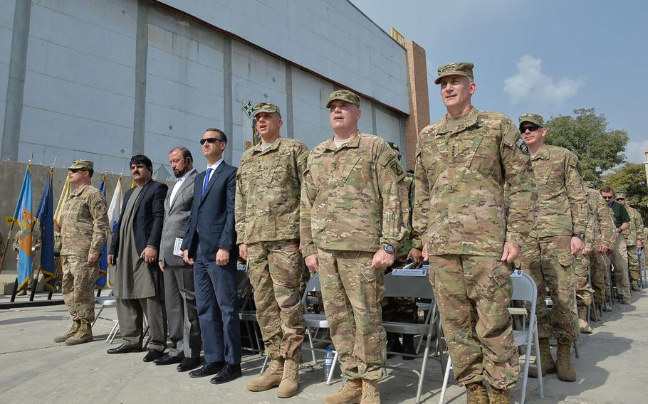 U.S. Army officials sing the 10th Mountain Division song during a transfer of authority ceremony at Bagram Air Field on Tuesday, Sept. 13, 2016.