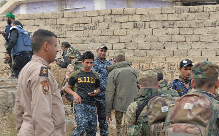 An Iraqi federal police officer in Hamam Alil, south of Mosul, wears what looks like a 5.11 Tactical shirt. The brand is popular among Iraqi forces fighting the Islamic State group for control of Mosul, but several impostors and clones are being sold in Iraqi markets.