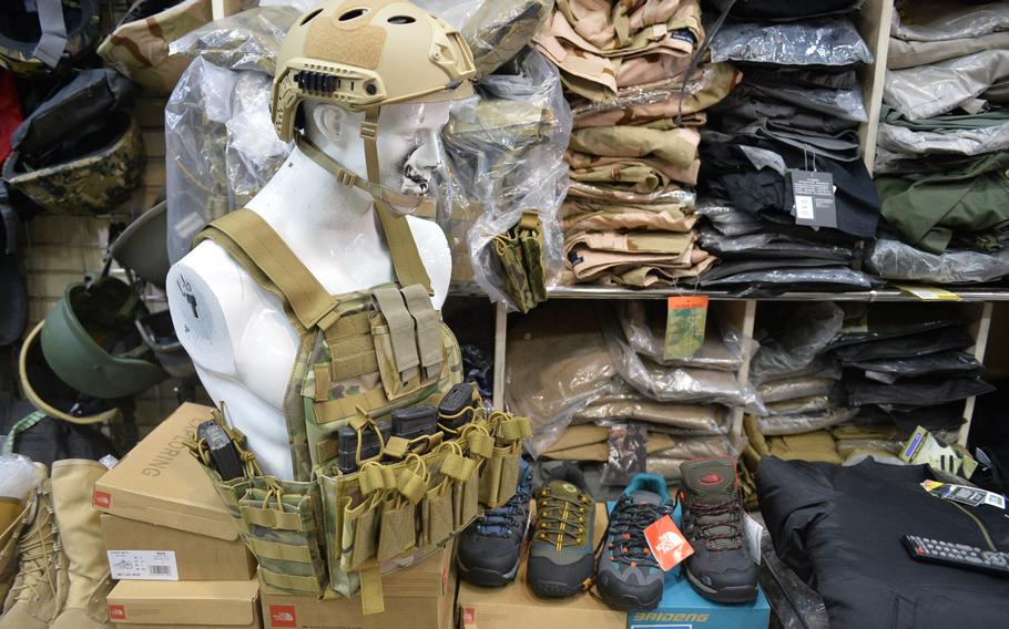 Tactical and outdoor gear, including boots marked with the North Face branding, are on display in a shop called Shanghai in Irbil, Iraq, Dec. 23, 2016. Fakes are not uncommon in Iraq, where security forces and others have popularized American brands like 5.11 Tactical, a company known for making durable clothes and accessories.

