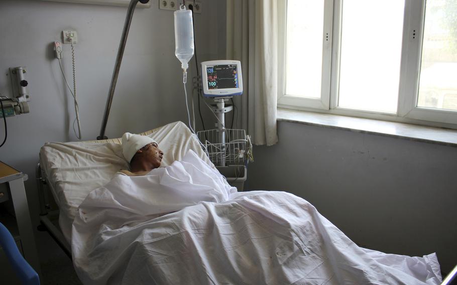 An injured soldier recovers in a hospital after Friday's attack at a military compound in Mazar-e-Sharif province north of Kabul, Afghanistan, Saturday, April 22, 2017. 