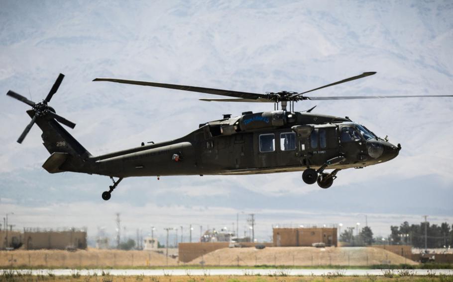 U.S. Army UH-60 Black Hawk helicopter pilots assigned to Task Force Flying Dragons, 16th Combat Aviation Brigade, 7th Infantry Division land at Bagram Airfield, Afghanistan, June 9, 2017.