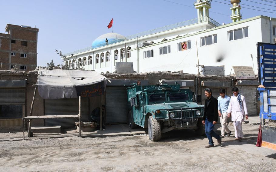 An Afghan security forces vehicle is part of a heavy police presence at the Imam Zaman mosque in Kabul, Afghanistan, on Saturday, Oct. 21, 2017. 