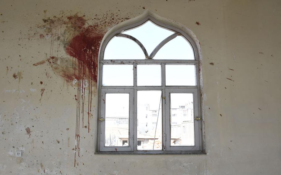 Blood stains the walls of the Imam Zaman mosque in Kabul, Afghanistan, on Saturday, Oct. 21, 2017, a day after an Islamic State suicide bomber targeted Shiite worshipers. 