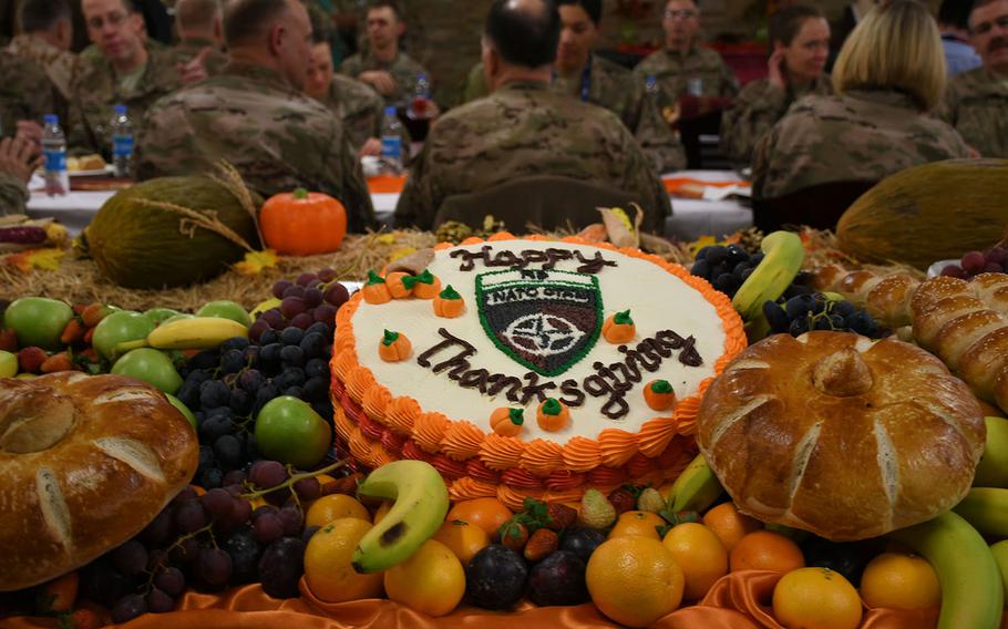A Thanksgiving cake with NATO's logo on it was served at the alliance's Afghan headquarters in Kabul, Afghanistan, on Thursday, Nov. 23, 2017. 

