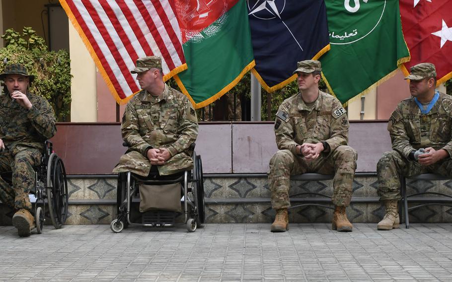 Retired Marine Cpl. Matthew Bradford, left, retired Army Staff Sgt. Lucas Cifka, retired Senior Airman Aubrey Hand III and retired Army Master Sgt. Leroy Petry (a Medal of Honor recipient), at NATO’s headquarters in Afghanistan on Saturday, Dec. 9, 2017.