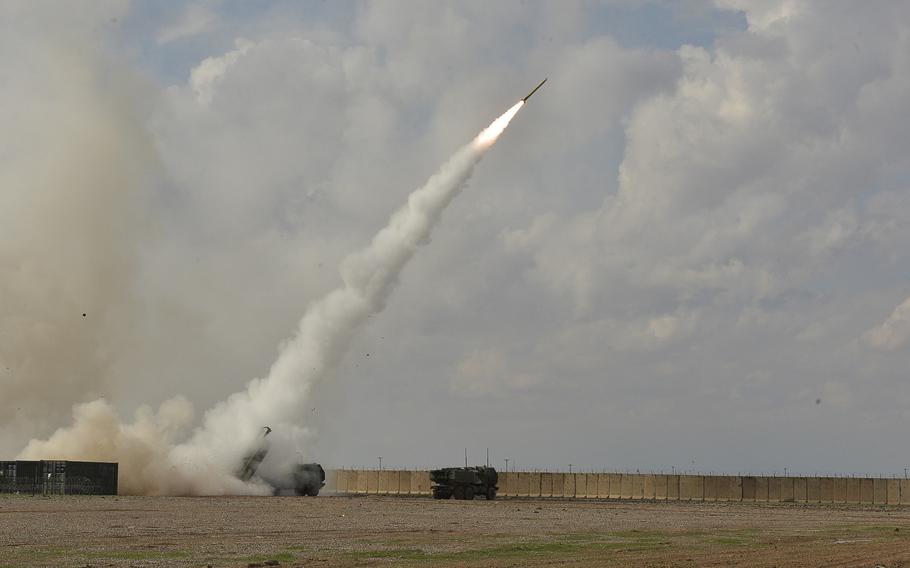 A rocket is launched from a High Mobility Artillery Rocket System on Qayara Airfield West, Iraq, toward Islamic State targets roughly 40 miles away in Mosul, March 17, 2017.

