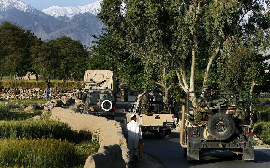 Afghan National Army commandos, assisted by members of Combined Joint Special Operations Task Force Afghanistan, conduct a security patrol through the Achin district of Afghanistan’s Nangarhar province, April 30, 2009. An American servicemember and his Afghan interpreter were wounded Thursday, Jan. 12, 2018, after being lured into a meeting in Achin district with an insurgent group posing as a local militia.