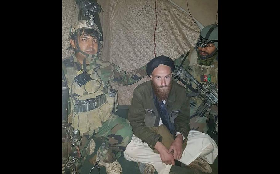 A man believed to be a German national is held after being caught with a group of Taliban fighters in Afghanistan's Helmand province.