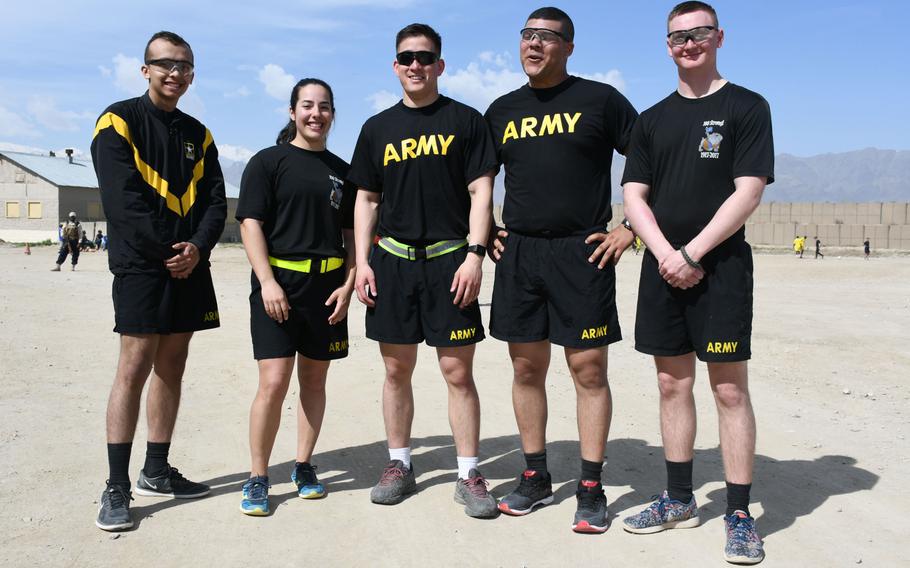 Team U.S.A.: Army Spc. Isac Suazo, from left, Army 1st Lt. Kori Nunes, Army 1st Lt. Kevin McNicholas, Army Spc. Christafer Bingham and Army Pfc. Austin Callihan pose for a photo after losing to a Ugandan team in the Bagram World Cup soccer tournament on Friday, March 23, 2018.

