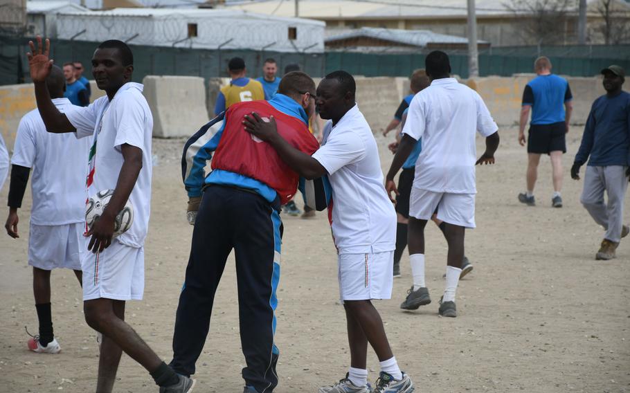 Zimbabwe players in white compete against Czech players in blue during a Bagram World Cup soccer match on Friday, March 23, 2018.
