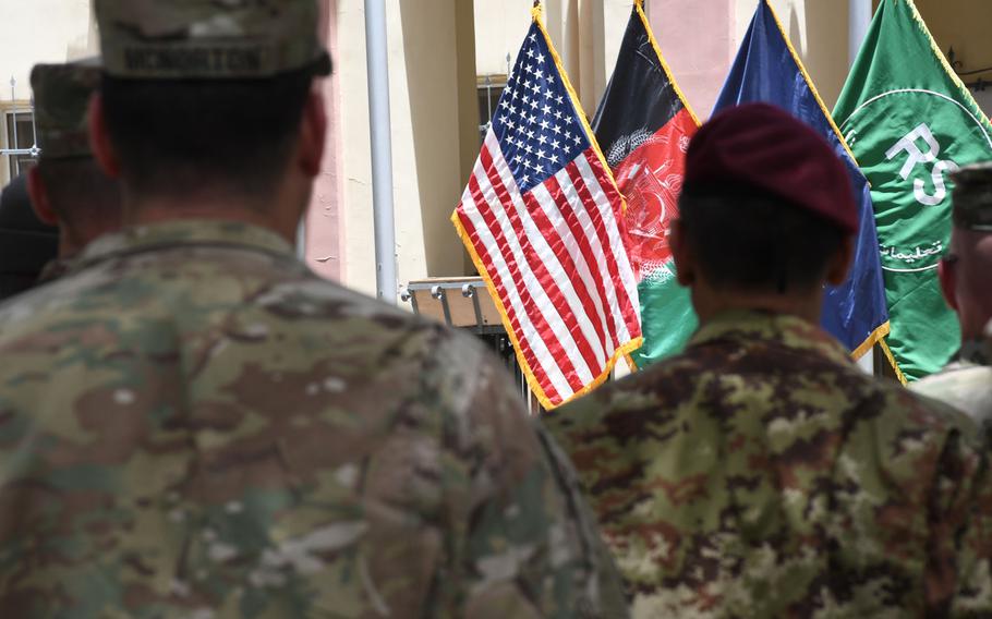 U.S. and coalition troops attend an Independence Day ceremony at NATO's Resolute Support headquarters on Wednesday, July 4, 2018. 