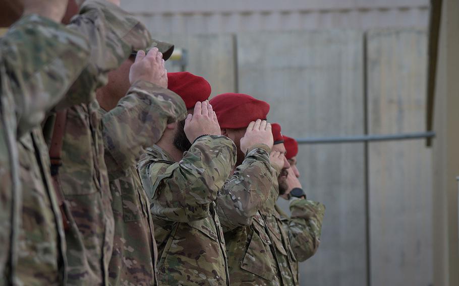 Airmen salute during the Medal of Honor ceremony for U.S. Air Force Master Sgt. John Chapman on Bagram Airfield, Afghanistan, August 28, 2018. Chapman was posthumously awarded the MOH for his actions during the Battle of Takur Ghar, also known as Roberts Ridge, in Afghanistan in March 2002. 