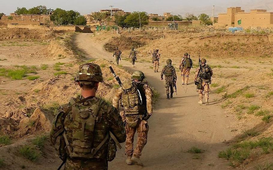 Raider soldiers from 4th Battalion, 9th Infantry Regiment, 1st Stryker Brigade Combat Team, 4th Infantry Division and soldiers from the Czech Army conduct a patrol in Eastern Afghanistan on July 25, 2018. Five Czech soldiers were injured by a suicide bomb blast in Afghanistan on Wednesday, Oct. 17, 2018. 