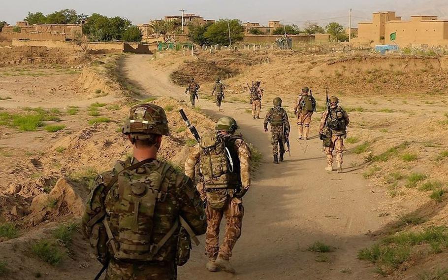 Raider soldiers from 4th Battalion, 9th Infantry Regiment, 1st Stryker Brigade Combat Team, 4th Infantry Division and soldiers from the Czech Army conduct a patrol in Eastern Afghanistan on July 25, 2018. Five Czech soldiers were injured by a suicide bomb blast in Afghanistan on Wednesday, Oct. 17, 2018.