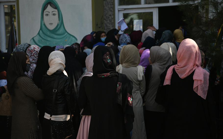 Female voters wait to vote for a new parliament at a polling center in Kabul’s Qala-e-Fathullah neighborhood on Saturday, Oct. 20, 2018. 