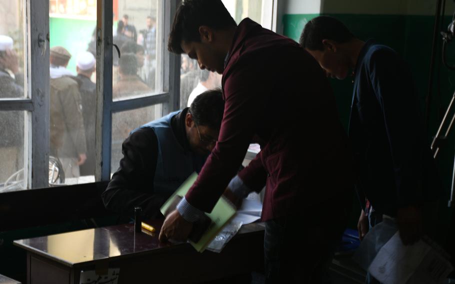 Afghans at a polling center in Kabul’s Qala-e-Fathullah neighborhood on Saturday, Oct. 20, 2018. The voting started about two hours late at the center because election officials weren’t prepared. 