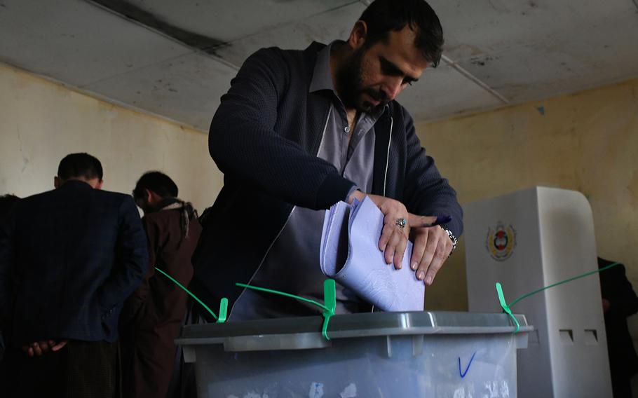 Kabul resident Habibullah Hayed votes in Afghanistan’s parliamentary elections on Saturday, Oct. 20, 2018.