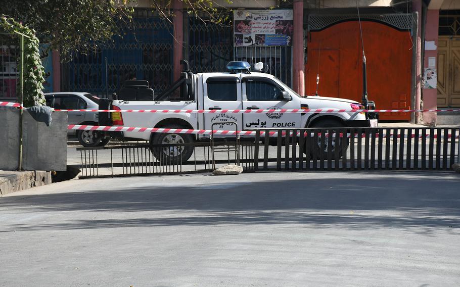 Police regulate traffic on a street that a polling center is located on, on Oct. 20, 29018. 