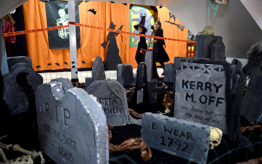 Children in costumes arrive at the Bahrain School’s Spooktakular event on Thursday, Oct. 25, 2018. 