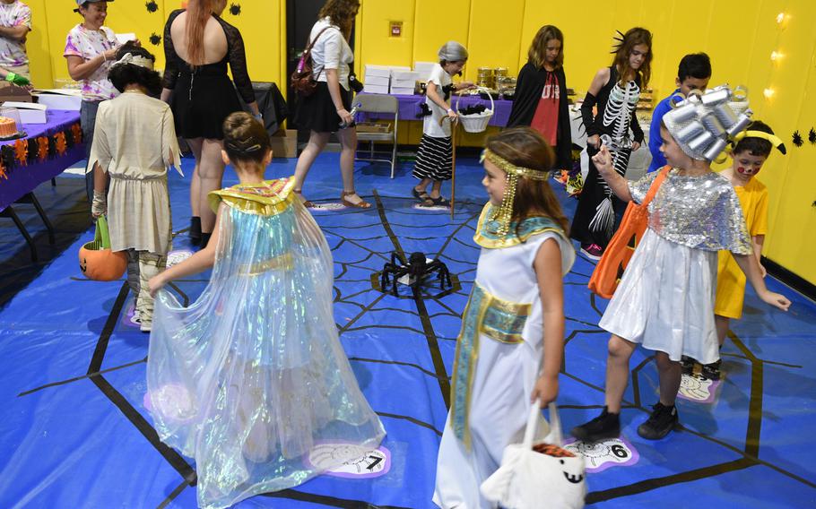 Children in costumes play games at the Bahrain School’s Spooktakular event on Thursday, Oct. 25, 2018.

