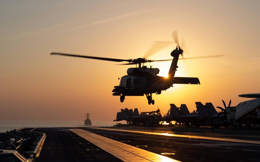 An MH-60R Sea Hawk takes off from the flight deck of the aircraft carrier USS John C. Stennis during a transit through the Strait of Hormuz, Dec. 21, 2018.