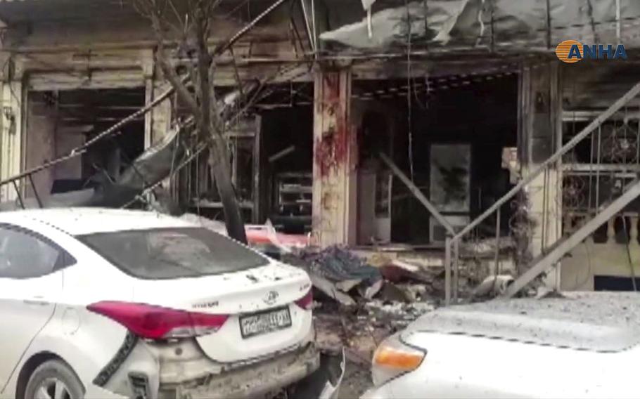 This frame grab from video shows a damaged restaurant where an explosion occurred, in Manbij, Syria, Wednesday, Jan. 16, 2019.