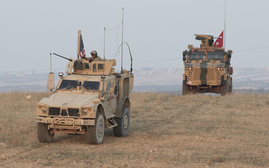 American and Turkish troops conduct a convoy during a joint combined patrol in Manbij, Syria, on Nov. 8, 2018. 