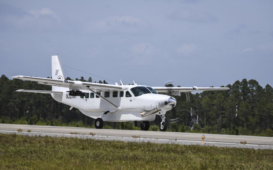 An AC-208 Combat Caravan lightweight reconnaissance aircraft lands at Hurlburt Field, Fla., May 3, 2018. 