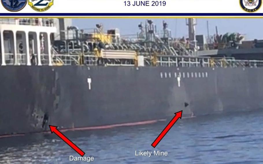 In this Powerpoint slide provided by U.S. Central Command, damage from an explosion, left, and a likely limpet mine can be seen on the hull of the civilian vessel M/V Kokuka Courageous in the Gulf of Oman on June 13, 2019, as the guided-missile destroyer USS Bainbridge, not pictured, approaches the damaged ship.
