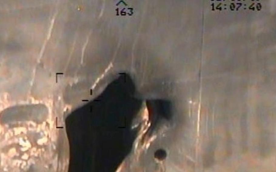 Imagery taken from a U.S. Navy MH-60R helicopter of blast Â damage to M/T Kokuka Courageous. M/V Kokuka Courageous received damage consistent with a limpet mine attack in the Gulf of Oman, June 13, 2019.