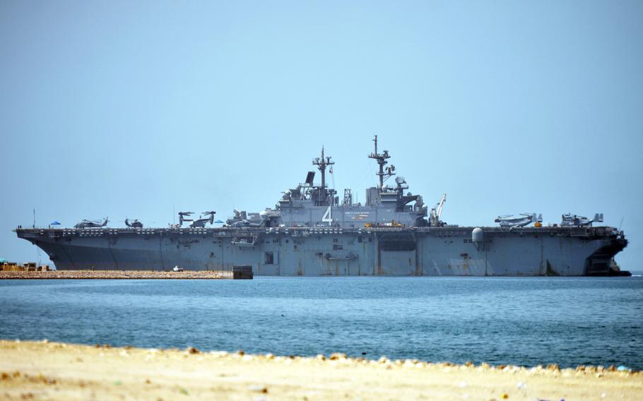 The amphibious assault ship USS Boxer arrives at Bahrain’s Khalifa bin Salman Port on Thursday, July 25, 2019, for a scheduled port visit. Last week, U.S. officials said the ship destroyed at least one Iranian drone while operating in the Persian Gulf.